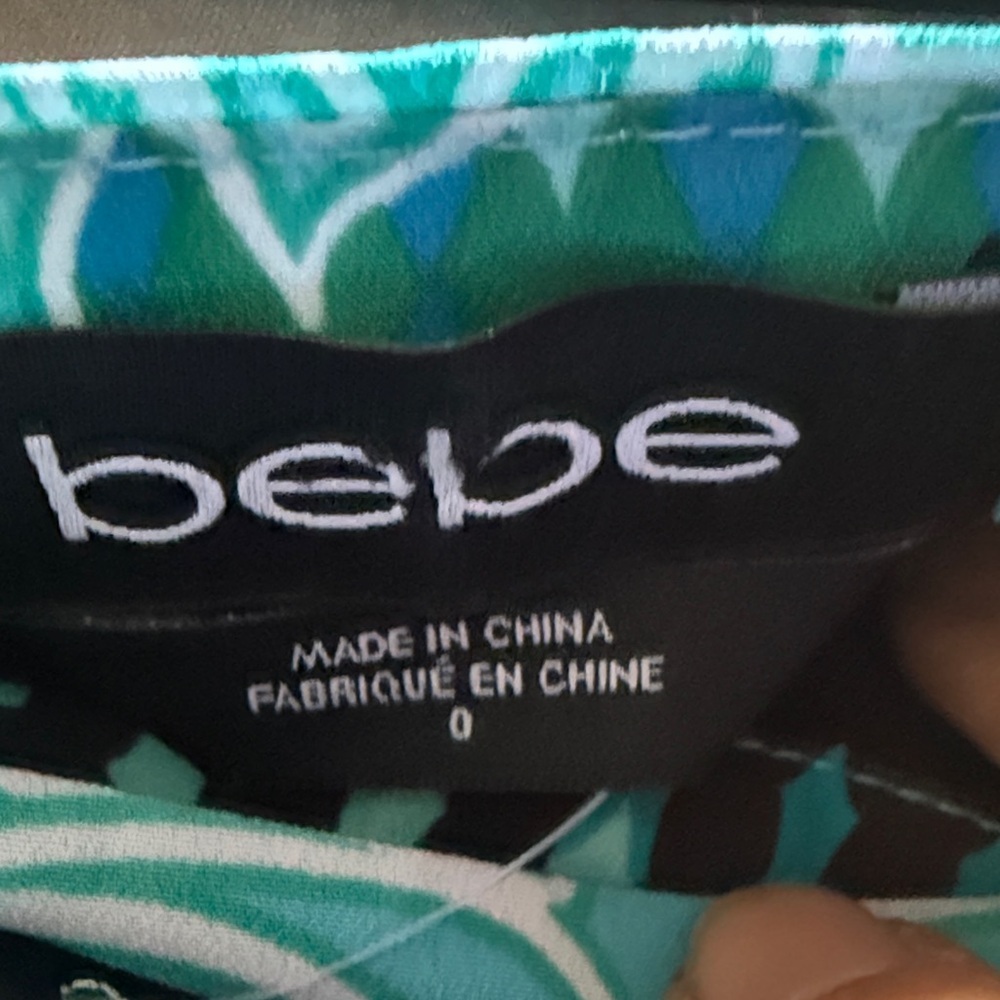 Bebe Teal and Black Patterned Wrap Mini Skirt size 0 - Picture 2 of 7